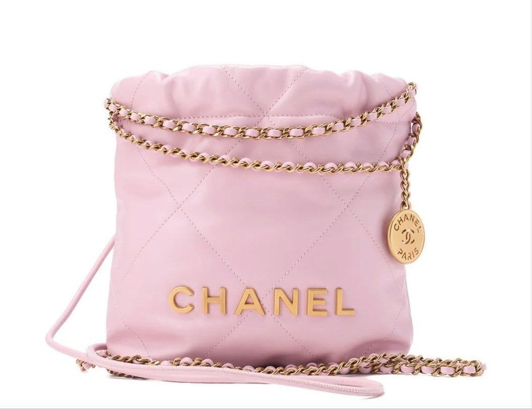 Sac CHANEL 22 cuir de veau rose chaîne dorée  / Eternel Luxe