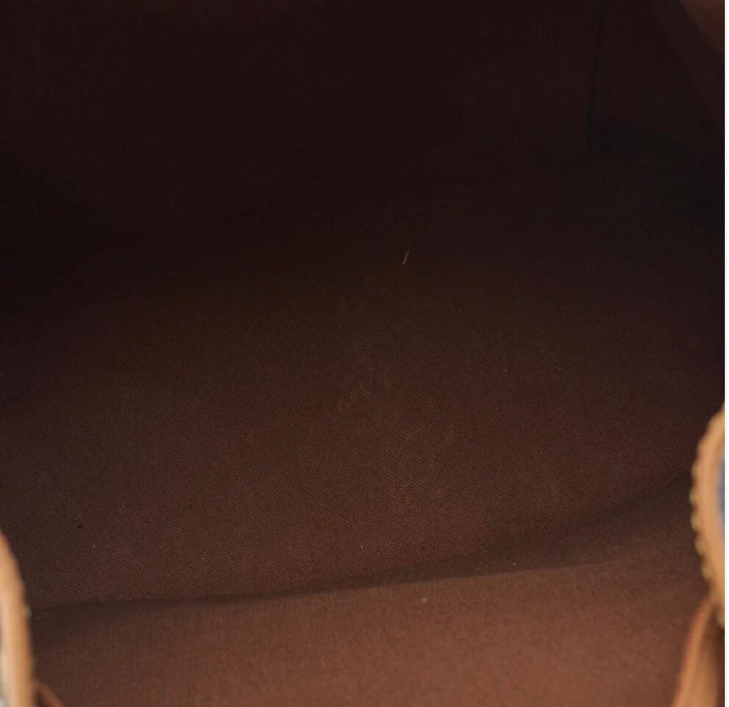 Sac à dos Louis Vuitton en toile Monogramme marron / Eternel Luxe