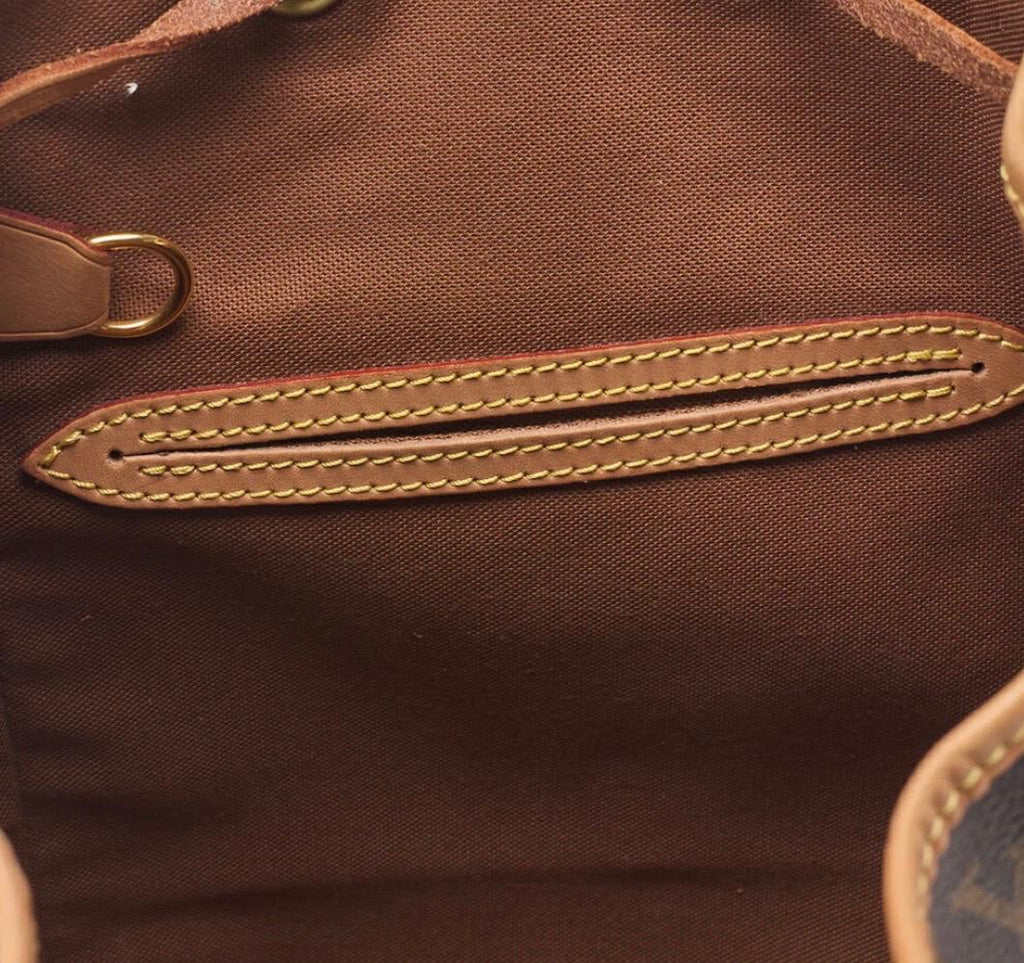 Sac à dos Louis Vuitton en toile Monogramme marron / Eternel Luxe