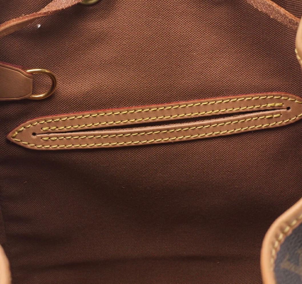 Sac à dos Louis Vuitton en toile Monogramme marron / Eternel Luxe