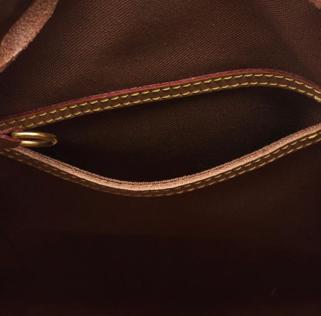 Sac à dos Louis Vuitton en toile Monogramme marron / Eternel Luxe