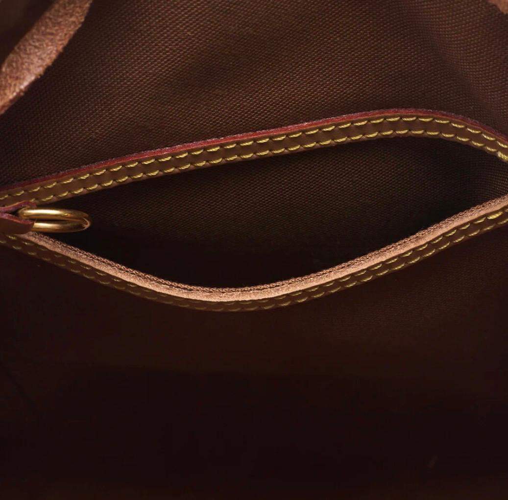 Sac à dos Louis Vuitton en toile Monogramme marron / Eternel Luxe