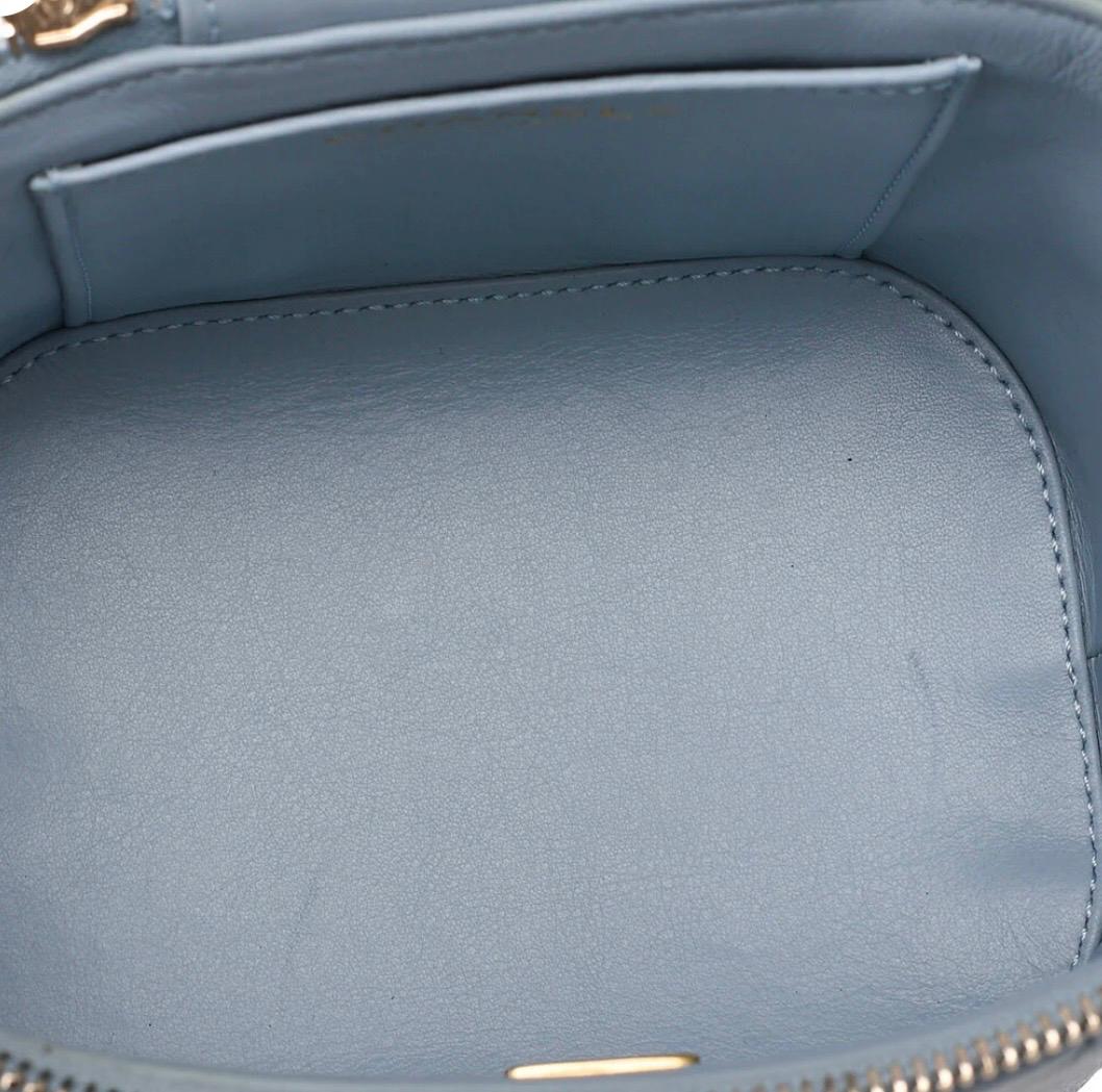 Sac CHANEL Coco Mark Circle Coco à cordon, en cuir d'agneau blanc / Eternel Luxe / Seconde main