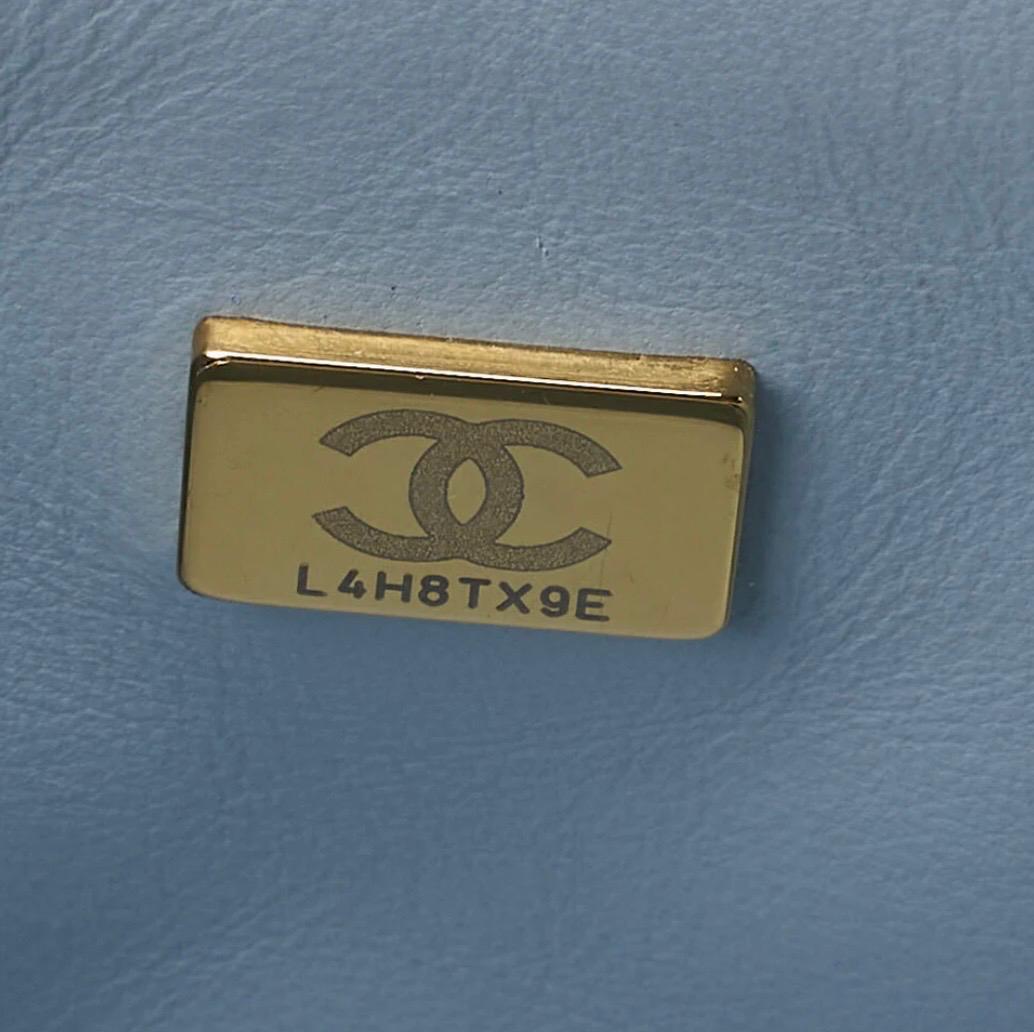 Sac CHANEL Coco Mark Circle Coco à cordon, en cuir d'agneau blanc / Eternel Luxe / Seconde main