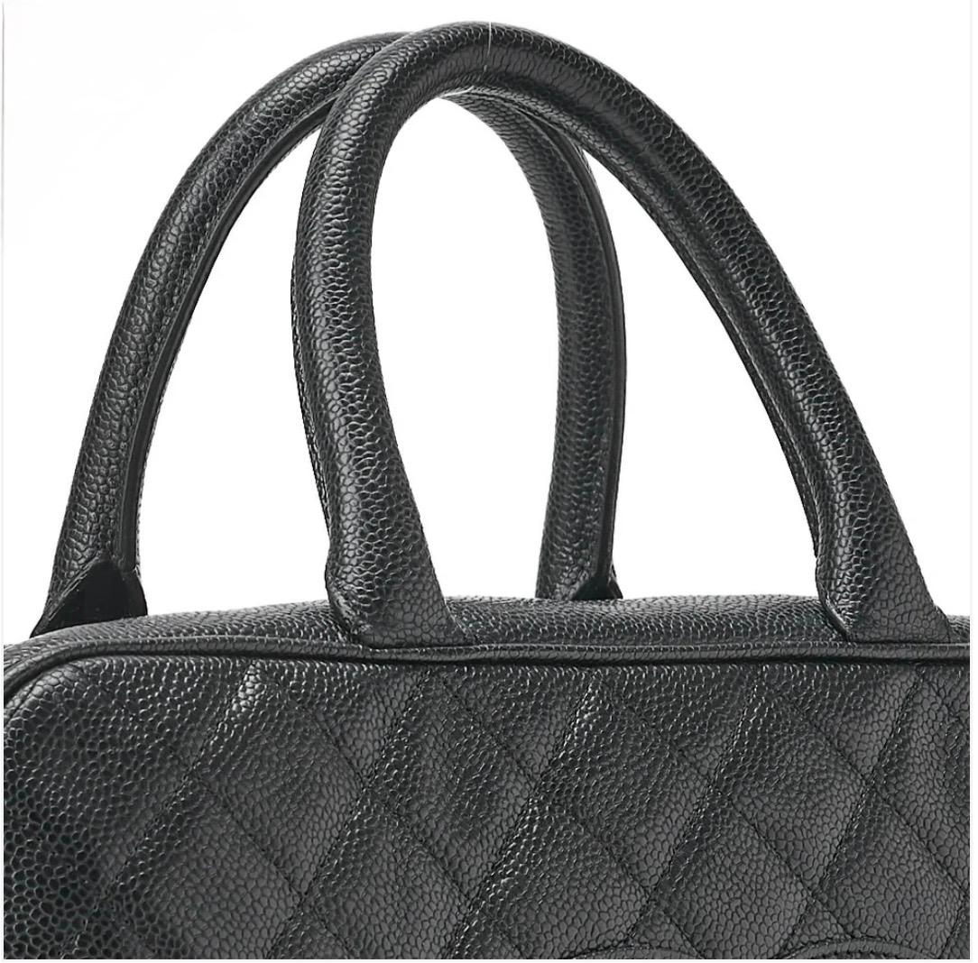 Sac  CHANEL Boston  cuir caviar noir Coco Mark