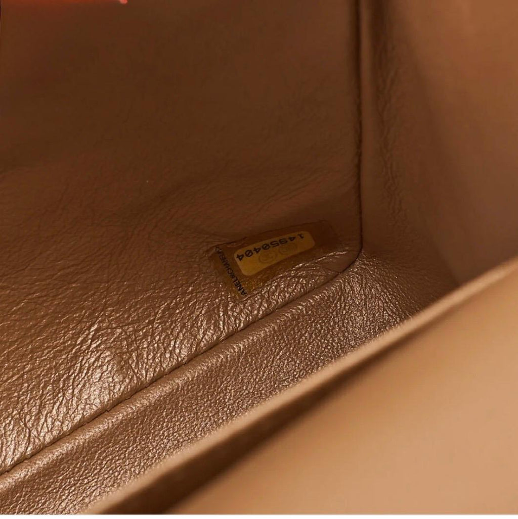 Sac Chanel Maxi 33 Deca Matelassé cuir caviar bronze