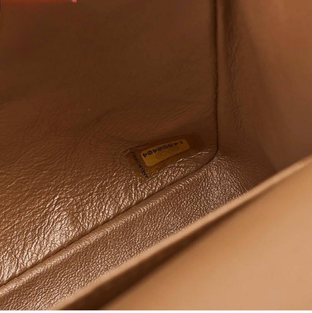 Sac Chanel Maxi 33 Deca Matelassé cuir caviar bronze