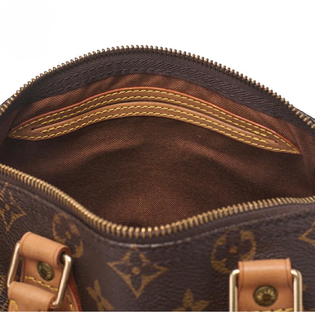 Louis Vuitton Speedy 25 Monogram – Sac à main iconique en toile Monogram marron seconde main