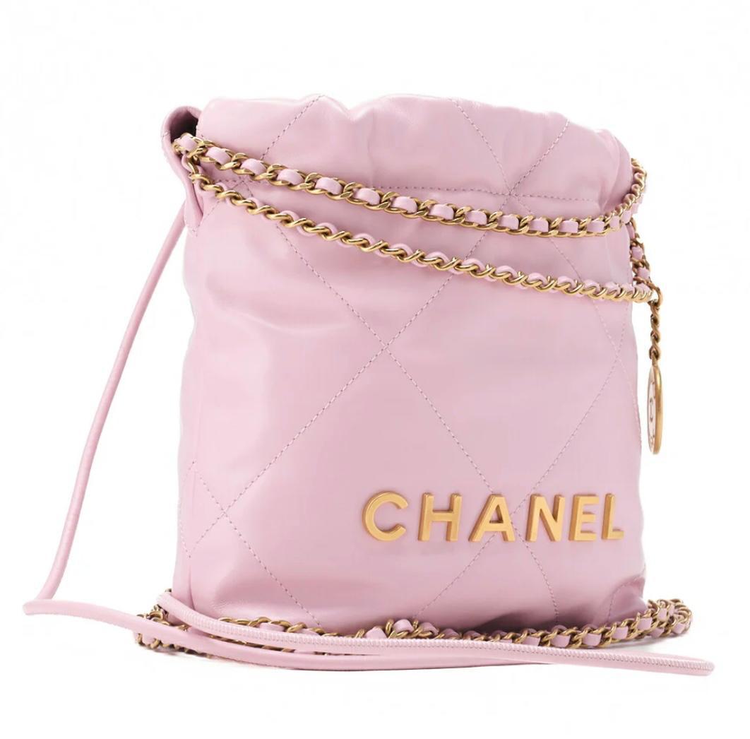 Sac CHANEL 22 cuir de veau rose chaîne dorée  / Eternel Luxe