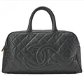 Sac Chanel Boston cuir caviar noir Coco Mark vintage authentique