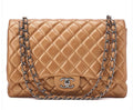Sac Chanel Maxi 33 Deca Matelassé cuir caviar bronze avec chaîne argentée